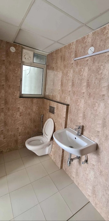 Bathroom in 3 BHK Apartment at Shapoorji Pallonji Joyville Phase 2, Sector 102 – for Rent