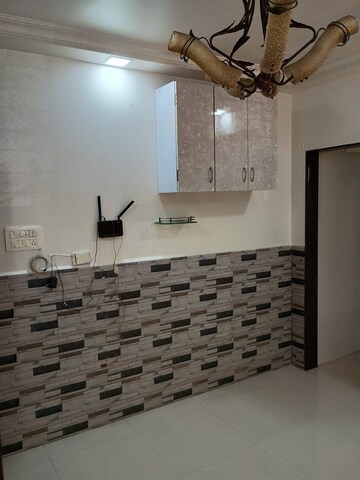 Master Bedroom in 1 BHK Apartment at Aditya Eksar Kavita, Borivali West – for Rent