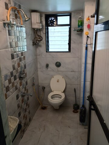 Bathroom in 1 BHK Apartment at Aditya Eksar Kavita, Borivali West – for Rent