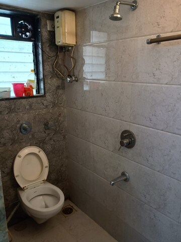 Bathroom in 1 BHK Apartment at Aditya Eksar Kavita, Borivali West – for Rent