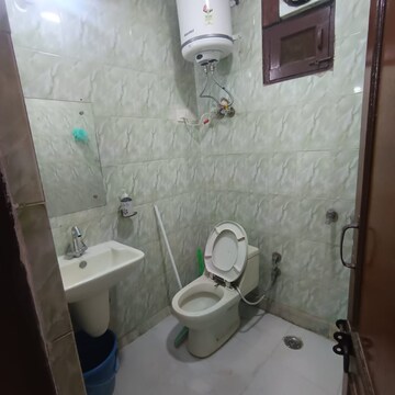 Bathroom in 3 BHK Builder Floor at Khirki Extension – for Rent