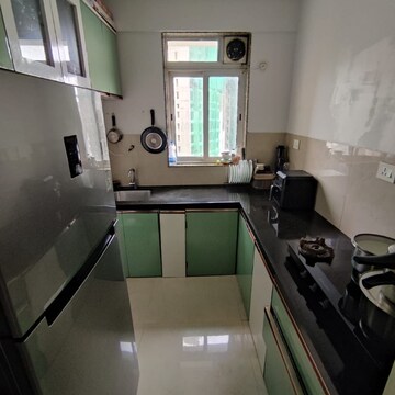 Kitchen in 2 BHK Apartment at Mahavir Universe Stellar CHS, Kukreja – for Rent