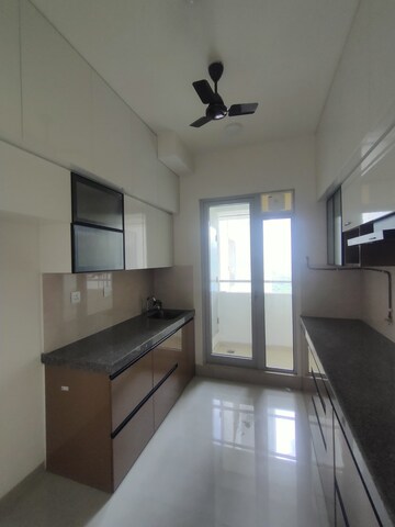 Kitchen in 2 BHK Apartment at Piramal Vaikunth, Balkum Pada – for Rent