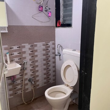 Bathroom in 1 BHK Apartment at Vasudev Heights CHS Ltd, Asha Nagar – for Rent