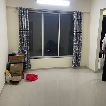 Living Room in 1 BHK Apartment at Vasudev Heights CHS Ltd, Asha Nagar – for Rent