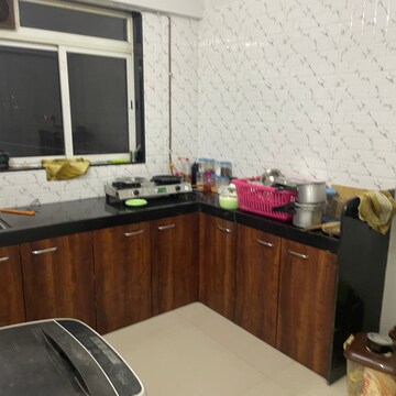 Kitchen in 1 BHK Apartment at Vasudev Heights CHS Ltd, Asha Nagar – for Rent