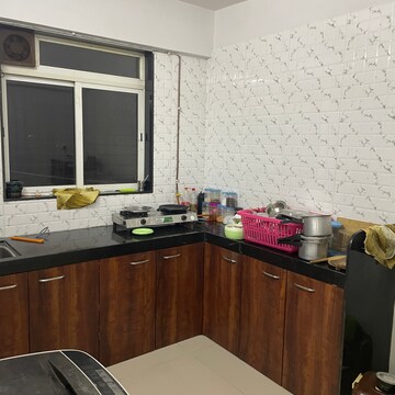 Kitchen in 1 BHK Apartment at Vasudev Heights CHS Ltd, Asha Nagar – for Rent