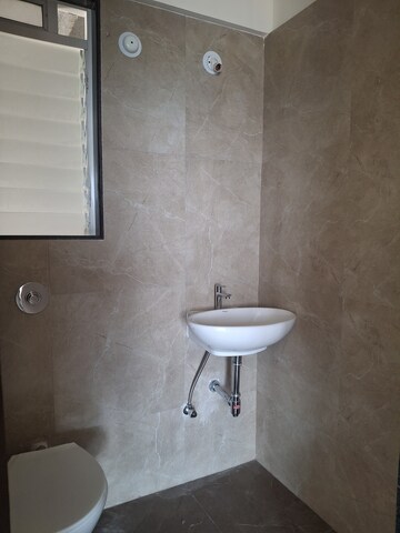 Bathroom in 1 BHK Apartment at Mahavir Kalpavruksha, Ghodbunder Road – for Sale