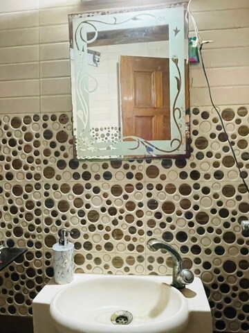 Bathroom in 2 BHK Apartment at Shri Radha Sky Park, Sector 16b Greater Noida – for Rent