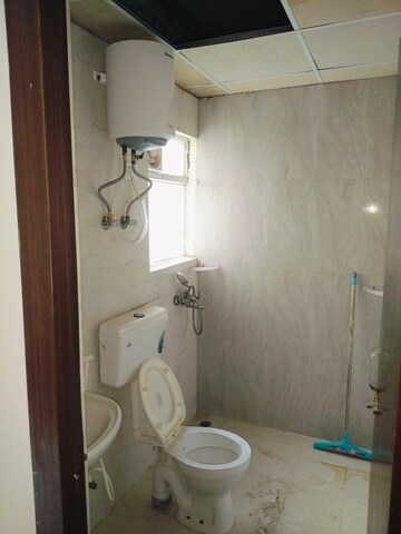 Bathroom in 2 BHK Apartment at Pivotal Riddhi Siddhi, Sector 99 – for Rent