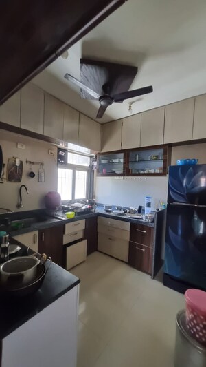 Kitchen in 2 BHK Apartment at Rosa Bella, Ghodbunder Road – for Sale