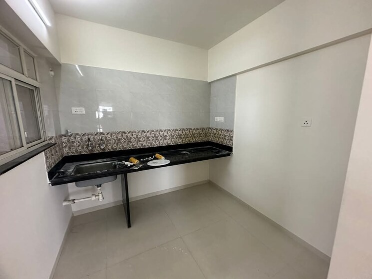 Kitchen, atrium-skyward 2 Bedroom 737 Sq.Ft. Apartment In Undri Pune 8902372