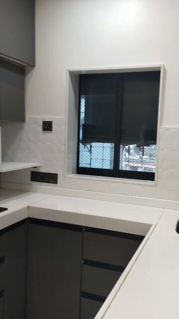 Kitchen in 2 BHK Apartment at Tarapore Gardens, Andheri West – for Rent