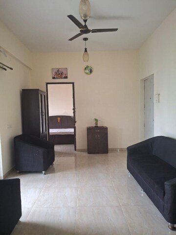 Living Room in 2 BHK Apartment at Ajmera Housing Society, Pimpri – for Rent
