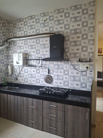 Kitchen in 2 BHK Apartment at Ajmera Housing Society, Pimpri – for Rent