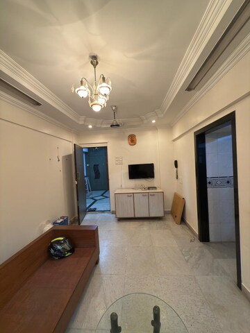 Living Room in 1 BHK Apartment at Harasiddh Viraaj, Malad East – for Rent