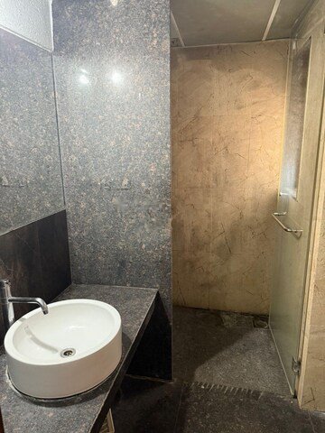 Bathroom in 3 BHK Apartment at Kumar Peninsula, Baner – for Rent