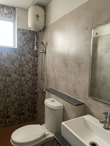 Bathroom in 3 BHK Apartment at Sushma Crescent, Dhakoli – for Rent