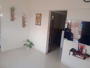 Living Room in 1 BHK Apartment at Jhamtani Ace Aurum, Ravet – for Rent