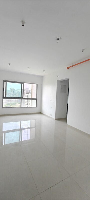 Living Room in 2 BHK Apartment at Kalpataru Immensa, Kolshet Road – for Rent