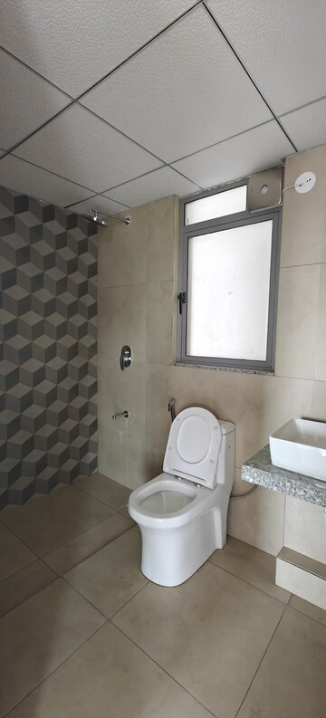 Bathroom in 2 BHK Apartment at Kalpataru Immensa, Kolshet Road – for Rent