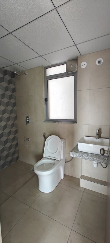 Bathroom in 2 BHK Apartment at Kalpataru Immensa, Kolshet Road – for Rent