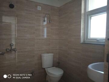 Bathroom in 4 BHK Builder Floor at BPTP Parkland Pride, Sector 77 – for Sale