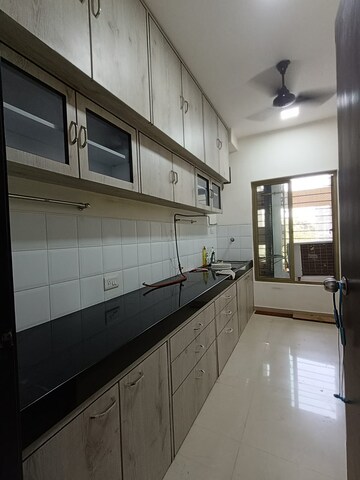 Kitchen in 3 BHK Apartment at Oberoi Realty Woods, Goregaon East – for Rent