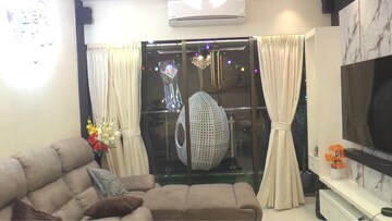 Living Room in 2 BHK Apartment at Acme Avenue, Kandivali West – for Sale