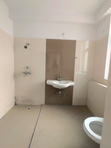 Bathroom in 4 BHK Apartment at Ramprastha Pearl Court, Vaishali Sector 7 – for Sale