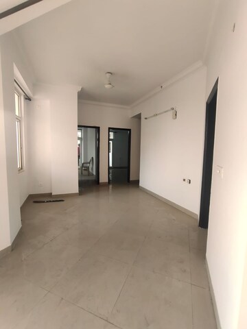 Living Room in 4 BHK Apartment at Ramprastha Pearl Court, Vaishali Sector 7 – for Sale