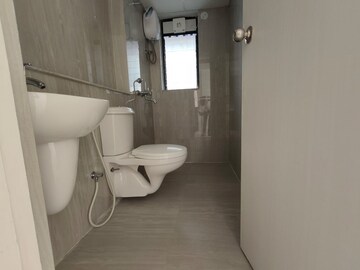 Bathroom in 3 BHK Apartment at Runwal Gardens Phase 2, Dombivli East – for Rent