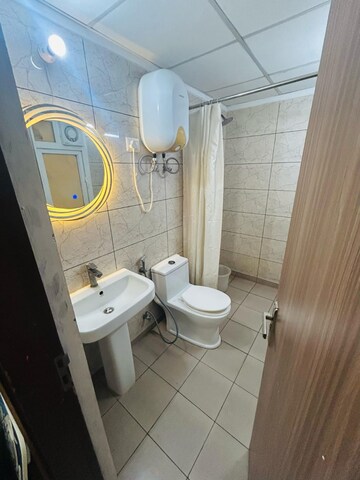 Bathroom in 3 BHK Apartment at Godrej Oasis, Sector 88a – for Sale