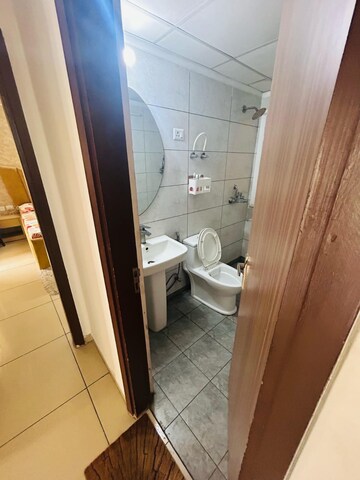 Bathroom in 3 BHK Apartment at Godrej Oasis, Sector 88a – for Sale
