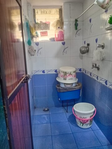 Bathroom in 1 BHK Apartment at Pareira Nagar CHS, Ganeshwadi – for Rent