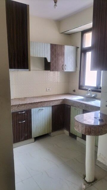 Kitchen in 2.5 BHK Apartment at SRS Royal Hills, Sector 87 – for Rent
