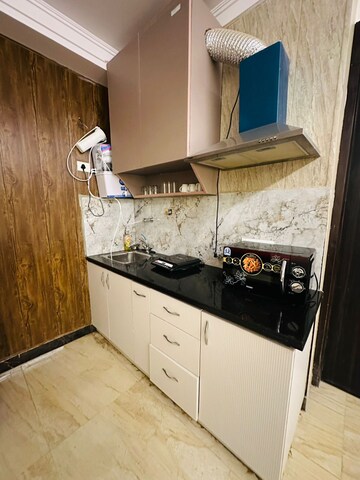 Kitchen in 1.5 BHK Builder Floor at Sector 45 – for Rent