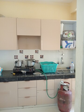 Kitchen in 2 BHK Apartment at Eureka Diya Green City, Raj Nagar Extension – for Sale