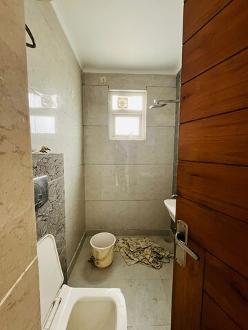 Bathroom in 4 BHK Builder Floor at Green Fields Colony – for Rent