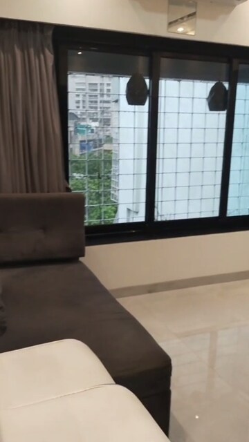 Room in 2 BHK Apartment at Tarapore Gardens, Andheri West – for Rent