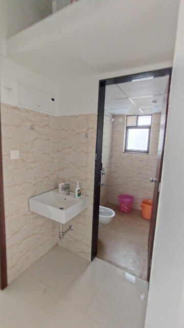 Bathroom in 3 BHK Apartment at Shapoorji Pallonji Sensorium, Hinjewadi – for Rent