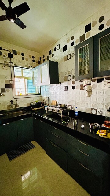 Kitchen in 2 BHK Apartment at Vaishnavi Sahil Vighnesh, Wakad – for Rent