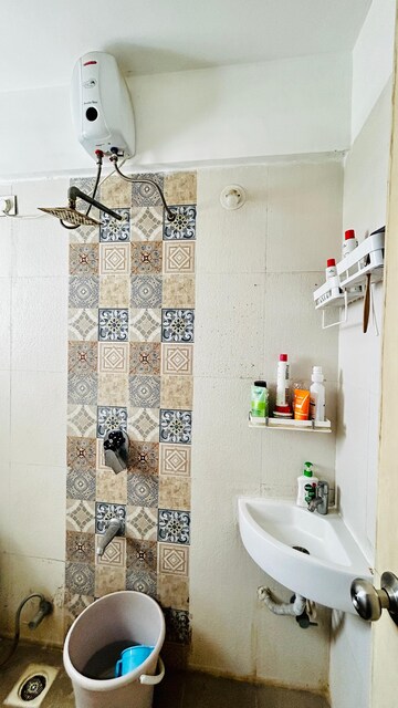 Bathroom in 2 BHK Apartment at Vaishnavi Sahil Vighnesh, Wakad – for Rent