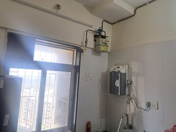 Kitchen in 2 BHK Apartment at Vihang Valley Phase 2, Kasarvadavali – for Rent