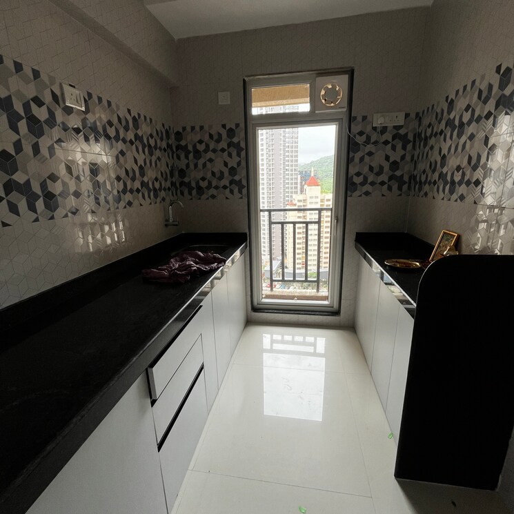 Kitchen, raunak-codename-bonus-city 1 Bedroom 424 Sq.Ft. Apartment In Haware City Thane 8903982