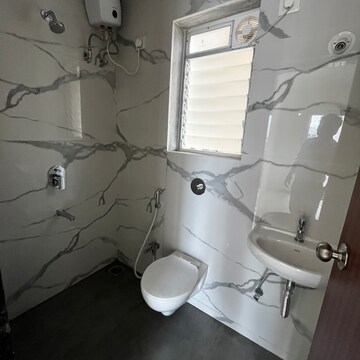 Bathroom in 1 BHK Apartment at Raunak Codename Bonus City, Haware City – for Rent