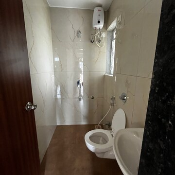 Bathroom in 1 BHK Apartment at Raunak Codename Bonus City, Haware City – for Rent