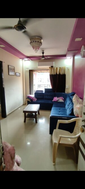 Living Room in 1 BHK Apartment at Nine Sea Grapes, Nalasopara West – for Sale