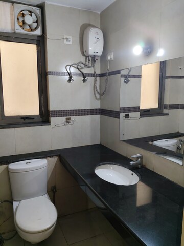 Attached Bathroom in 1.5 BHK Apartment at Unitech Uniworld Gardens 2, Sector 47 – for Rent