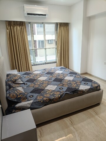 Bedroom in 3 BHK Apartment at Acropolis CHS, Vile Parle West – for Rent